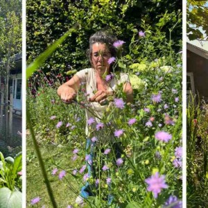 Vrouw die haar tuin aan het aanpakken is